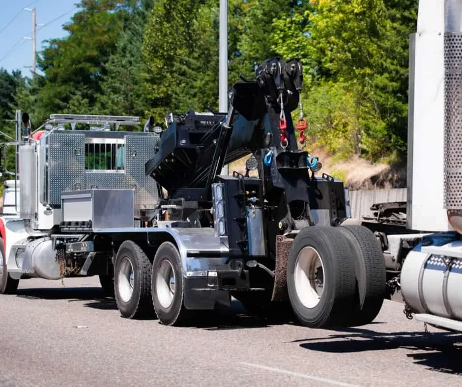 heavy-duty wrecker on a Barrhaven highway shoulder