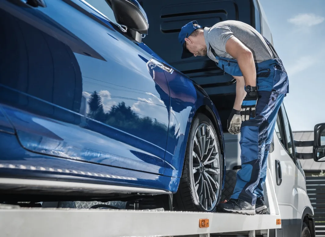 Orleans local tow truck loading vehicle