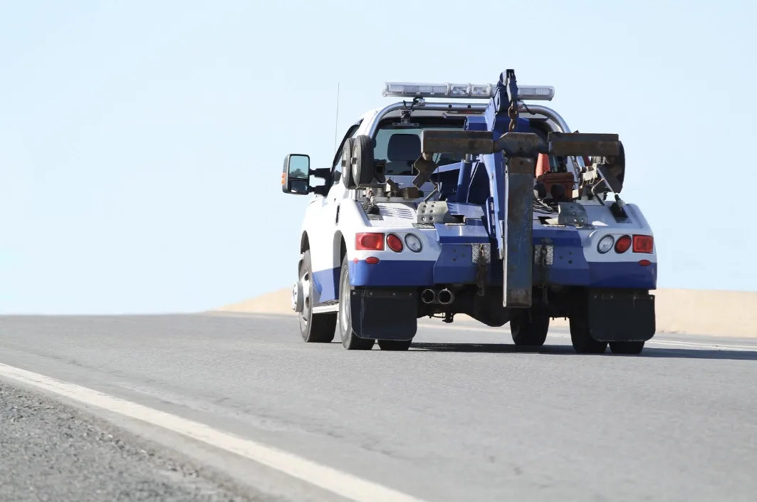 Orleans wrecker tow truck on the roadside